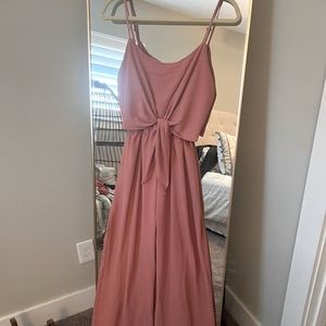 Pinkish mauve jumpsuit. Super cute, flowy leg, tie in front